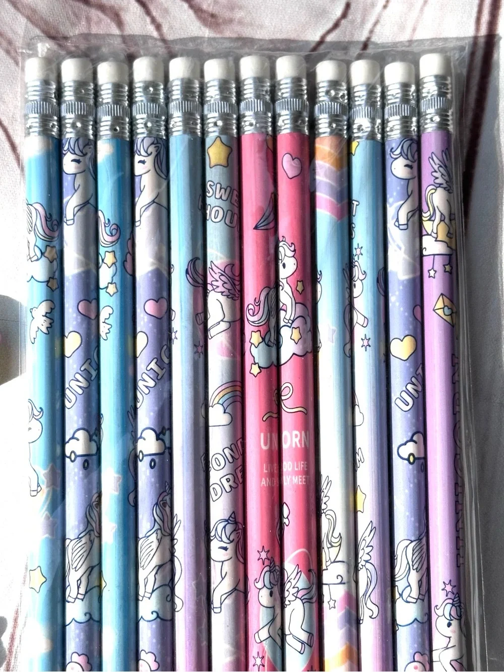 12 Rainbow Unicorn Pencil Set with Pastel Designs and Eraser Toppers